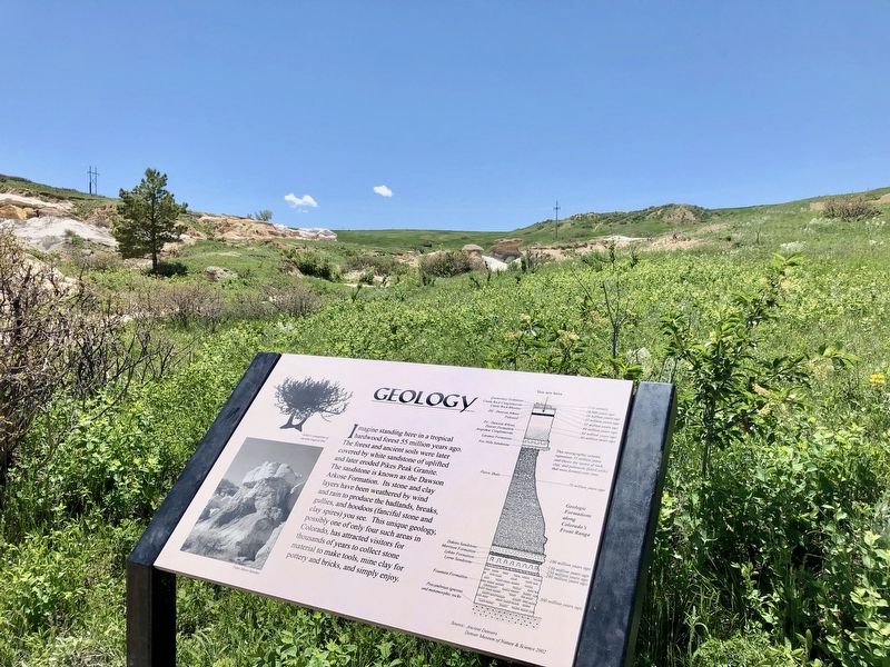 Geology Marker with portion of Paint Mines in background. image. Click for full size.