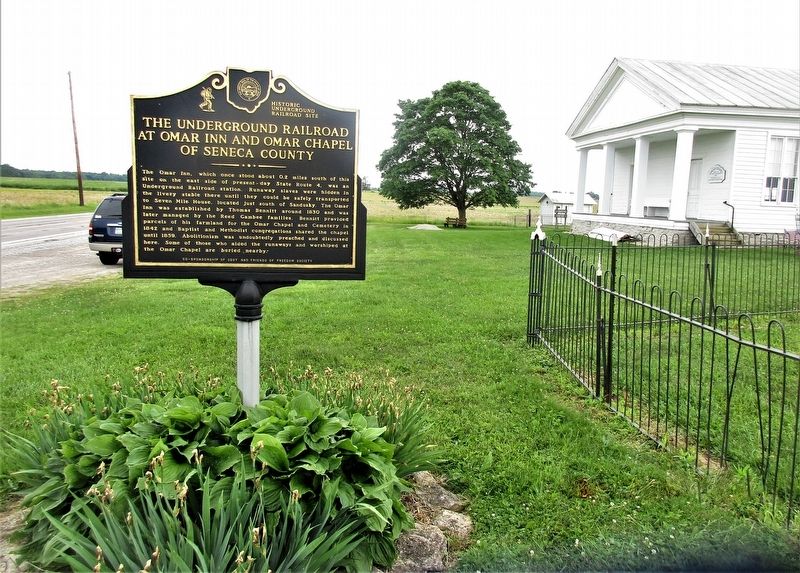 The Underground Railroad Marker with Omar Chapel to the right. Click for full size. The Underground Railroad Marker with Omar Chapel to the right image. Click for full size.