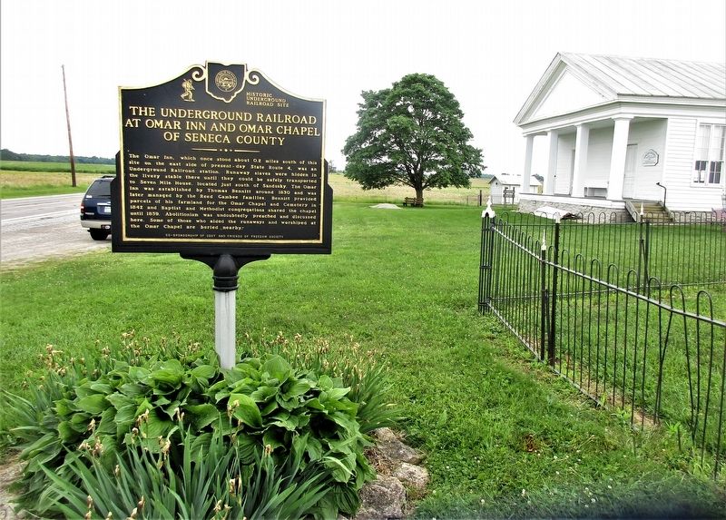 The Underground Railroad Marker with Omar Chapel to the right image. Click for full size.
