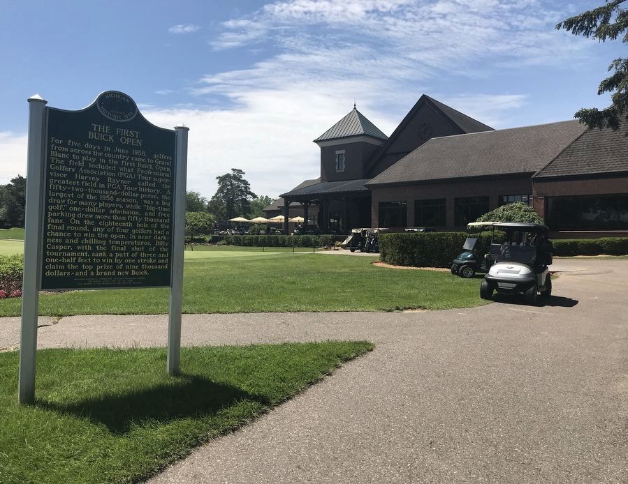 View of the Marker and the back of the clubhouse. image. Click for full size.
