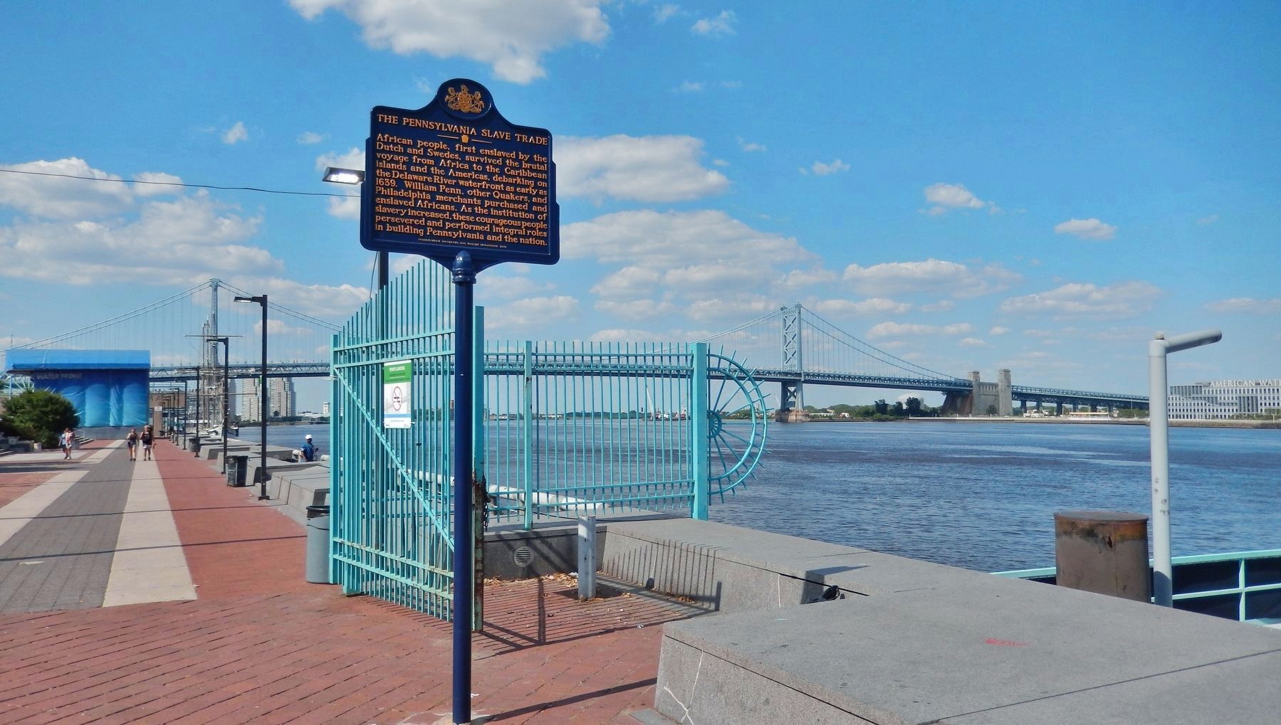 Pennsylvania Slave Trade Marker (<i>Delaware River & Ben Franklin Bridge in background to north</i>) image. Click for full size.