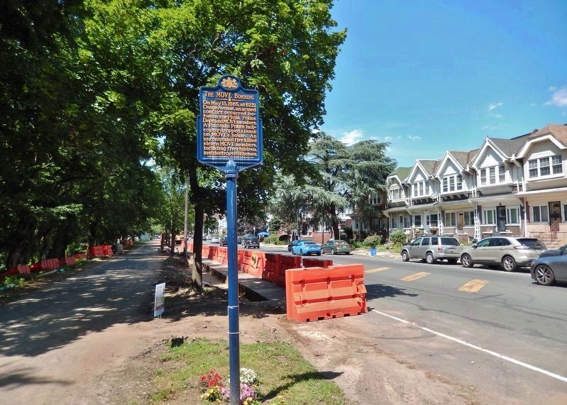 The MOVE Bombing Marker<br>(<i>wide view looking north along Cobbs Creek Parkway</i>) image. Click for full size.
