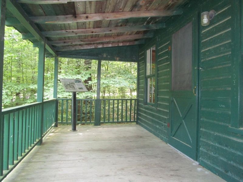 Marker on the Porch of the Park's Oldest Cabin image. Click for full size.