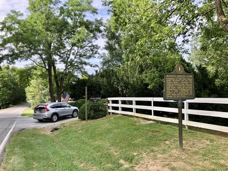 Looking south on KY-55 at Walnut Groves Farm gated entrance. image. Click for full size.