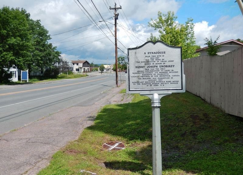Congregation Chaim Josef Marker south side<br>(<i>wide view looking north along Main Street</i>). Click for full size. Congregation Chaim Josef Marker south side<br>(<i>wide view looking north along Main Street</i>) image. Click for full size.