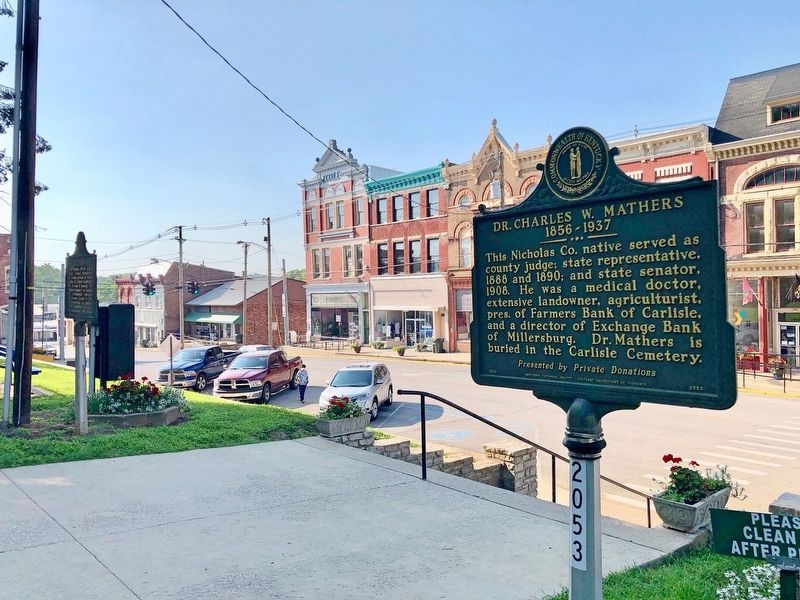 View of marker looking south at Main Street businesses. image. Click for full size.