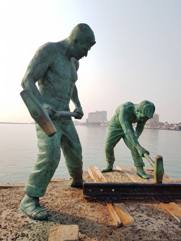 "Laying the Breakwater Track" sculpture detail. Click for full size. "Laying the Breakwater Track" sculpture detail image. Click for full size.