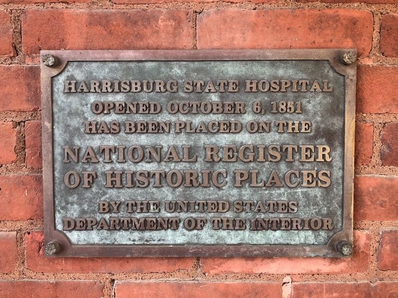 National Register Plaque on one of the buildings in the complex image. Click for full size.