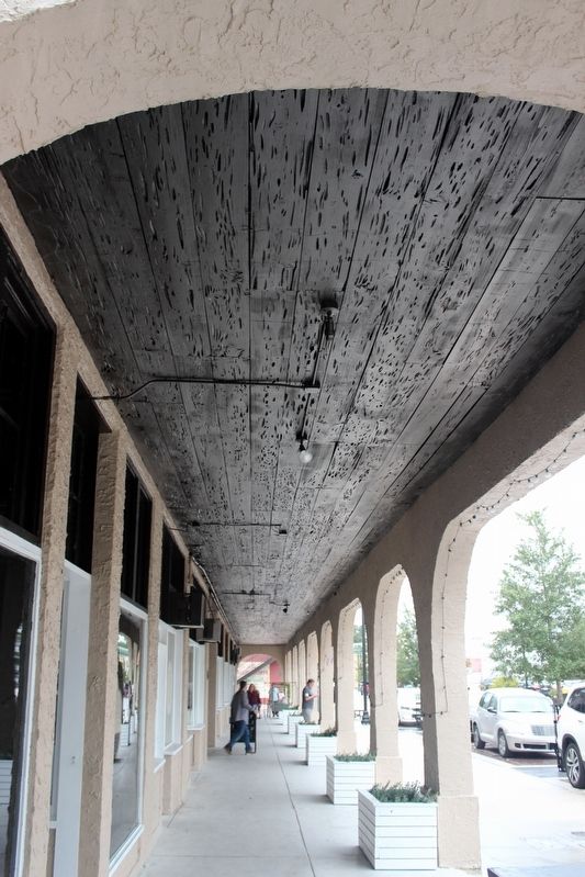 Pecky Cypress ceiling of front walkway. image. Click for full size.