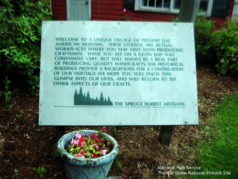 Spruce Forest Artisan Village Welcome Sign image. Click for full size.