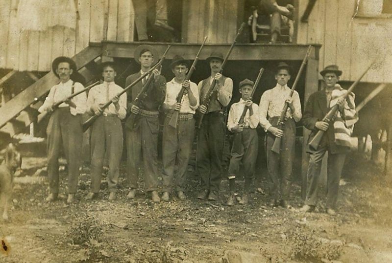 Miners posing with their guns in Eskdale WV image. Click for full size.