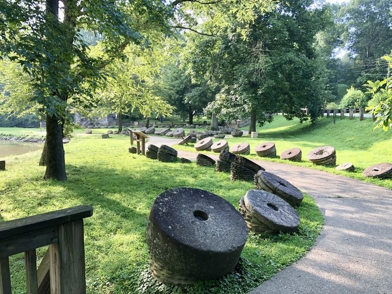 Millstones and the marker (farthest of two). image. Click for full size.