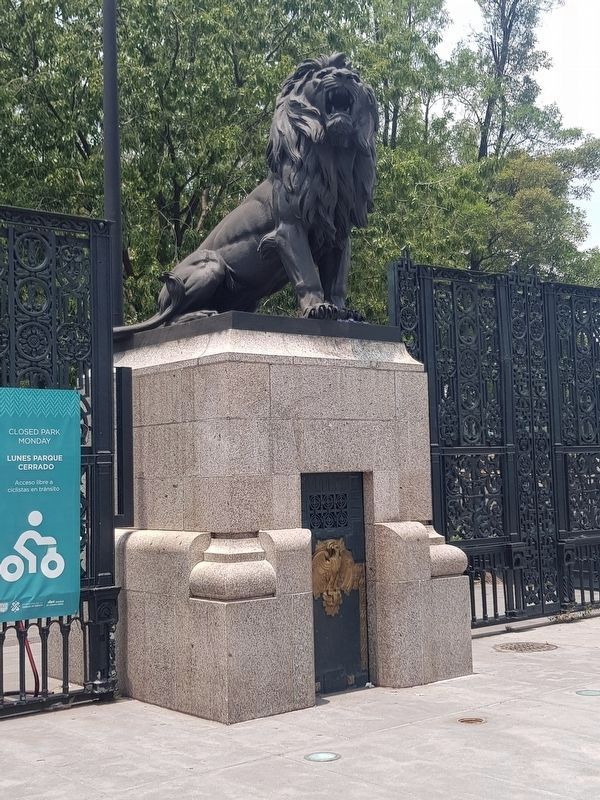 One of the lion sculptures and its base described in the marker text image. Click for full size.