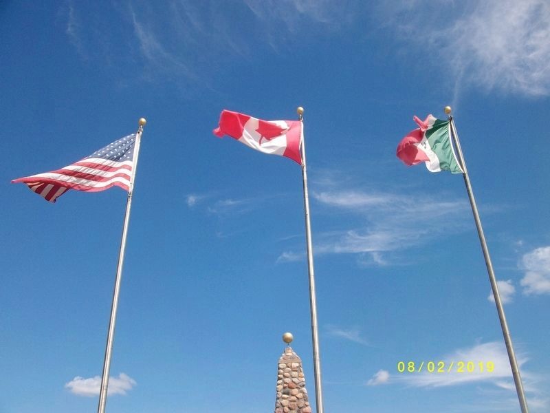 Flags at Geographical Center of North America Marker image. Click for full size.