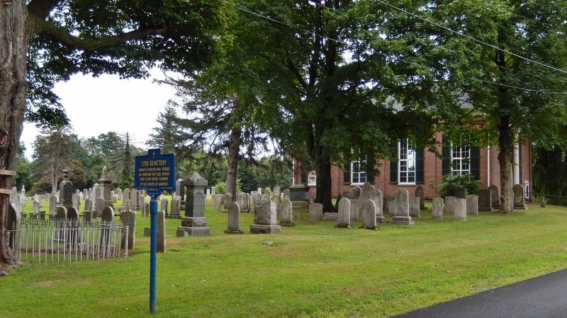 1700 Cemetery Marker<br>(<i>wide view • cemetery & Brick Church in background</i>) image. Click for full size.