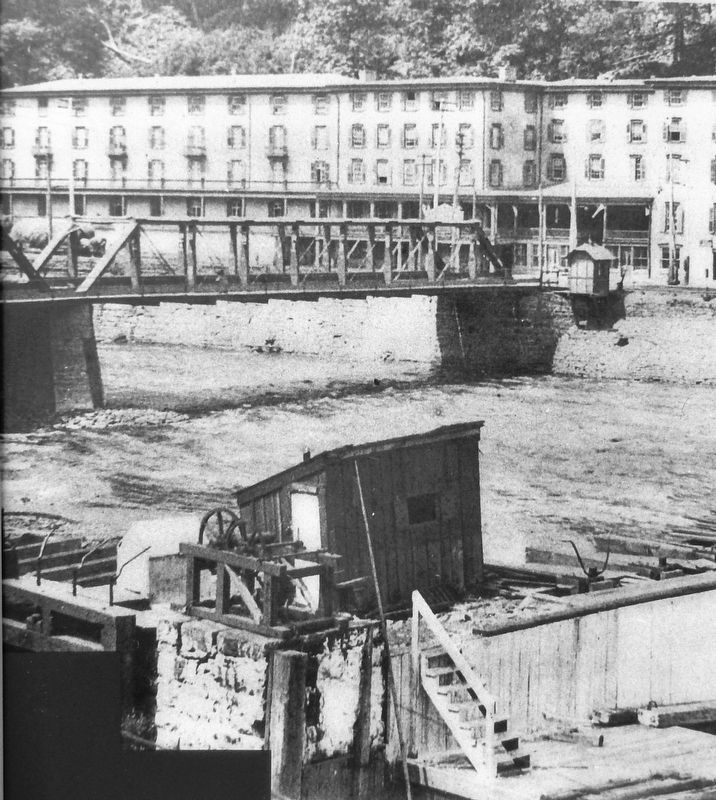 Marker detail: Mansion House Hotel and original pedestrian bridge from railroad tracks above Lock 1. Click for full size. Marker detail: Mansion House Hotel and original pedestrian bridge from railroad tracks above Lock 1 image. Click for full size.