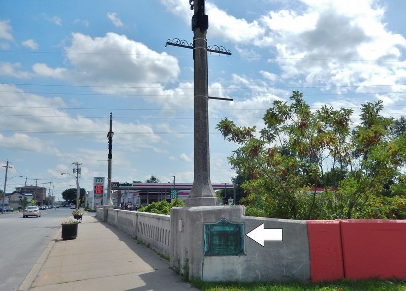 Willett Bridge Construction Plaque<br>(<i>wide view looking east along East Dominick Street</i>) image. Click for full size.