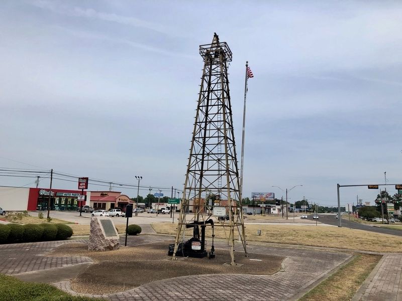 Wide view of markers and oil derrick looking northerly. image. Click for full size.