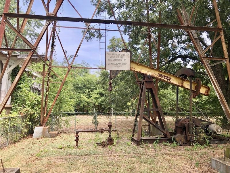 1984 oil derrick dedicated to Malcolm Crim, on the property. image. Click for full size.