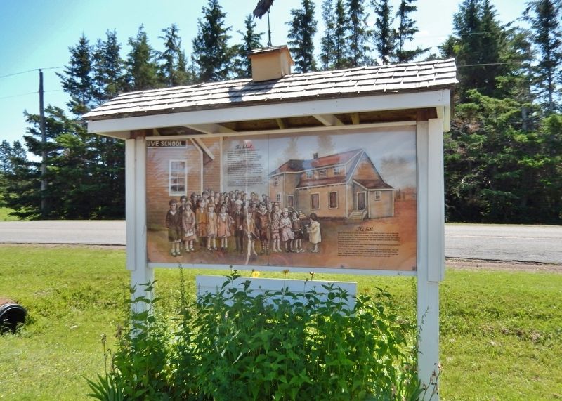 Canoe Cove School Marker<br>(<i>wide view • Canoe Cove Road is behind marker</i>) image. Click for full size.