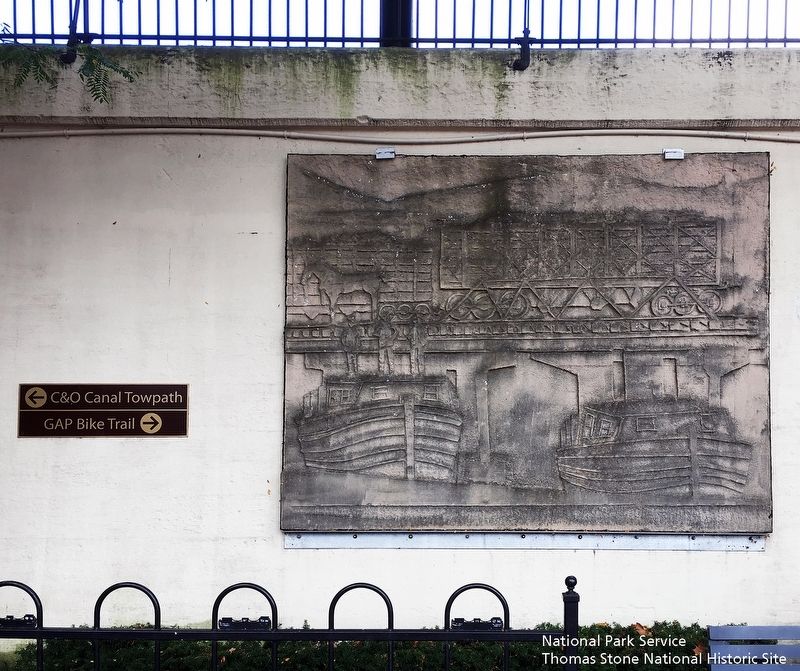 Transportation bas relief at south end of mural. image. Click for full size.