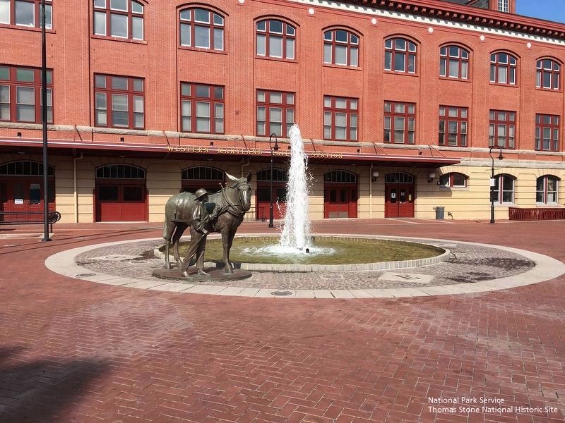 Mule and Handler Statue (foreground) and Western Maryland Train Station (background).. Click for full size. Mule and Handler Statue (foreground) and Western Maryland Train Station (background). image. Click for full size.