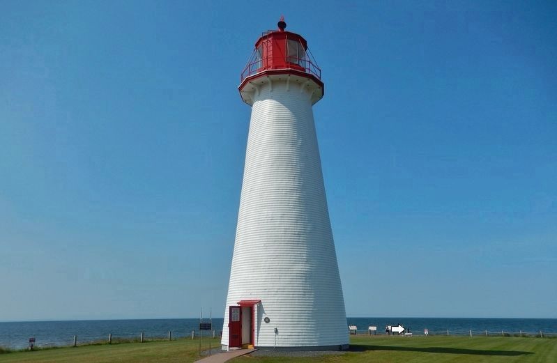 Point Prim Lighthouse  <i>view looking west<br>(marker visible, edge-on, in right background)</i> image. Click for full size.