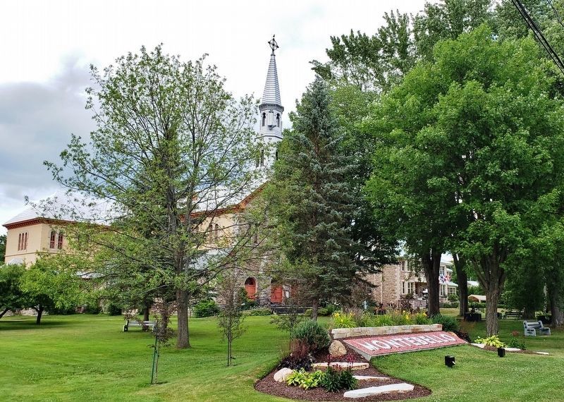 Notre-Dame-de-Bon-Secours Parish Church, Montebello<br>(<i>southwest corner view</i>). Click for full size. Notre-Dame-de-Bon-Secours Parish Church, Montebello<br>(<i>southwest corner view</i>) image. Click for full size.