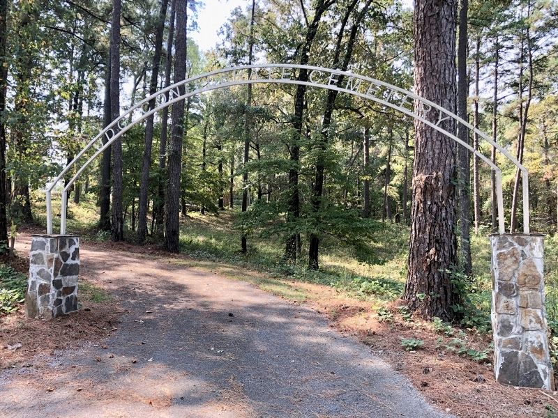 This entrance gate to the cemetery is located on Kewanee Road. image. Click for full size.