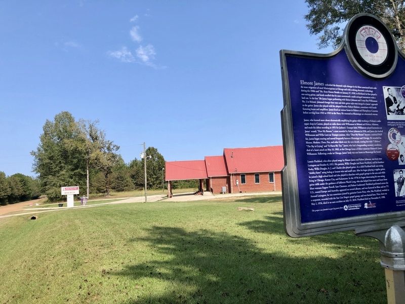 Elmore James Marker with Newport Baptist Church in background. image. Click for full size.