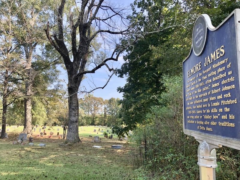 Elmore James Marker with cemetery in background. image. Click for full size.