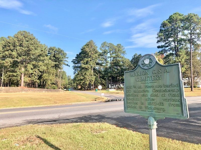 Looking up Confederate Drive towards the cemetery. image. Click for full size.
