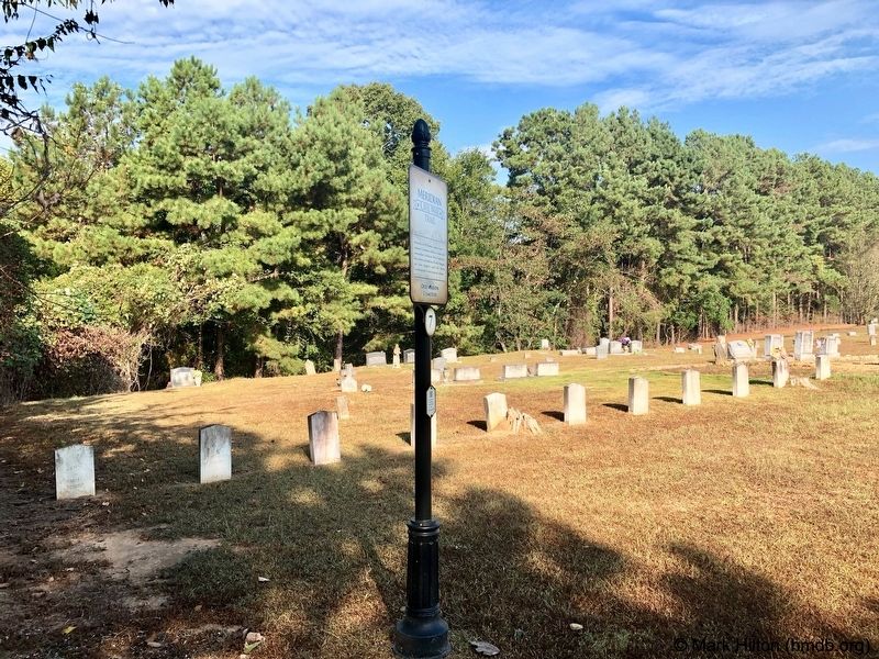 Old Marion Cemetery Marker and the memorial graves. image. Click for full size.