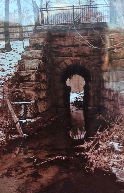 Munnisunk Brook flowing under the 1850 railroad and current Canal Greenway.. Click for full size. Munnisunk Brook flowing under the 1850 railroad and current Canal Greenway. image. Click for full size.