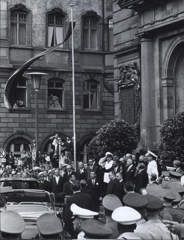 <i>President Kennedy Responds To Cheers From The Crowd As He Leaves...Paulskirche in Frankfurt</i>. Click for full size. <i>President Kennedy Responds To Cheers From The Crowd As He Leaves...Paulskirche in Frankfurt</i> image. Click for full size.