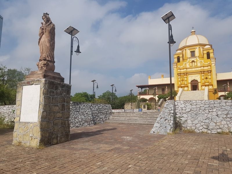 The Purísima Statue Marker, with the Bishop's Palace to the right in the background image. Click for full size.
