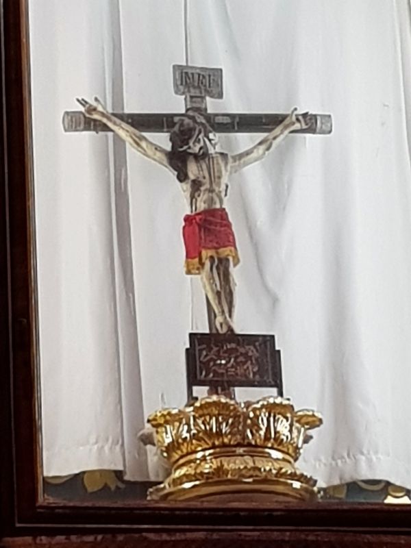 The altar's crucifix at the Temple of the Lord of the Precious Blood of Christ image. Click for full size.