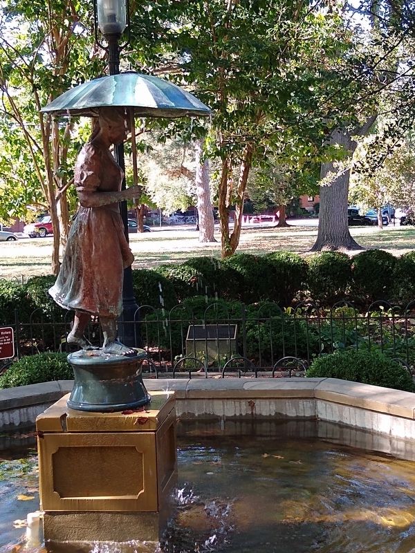 Grace's Garden Marker and Umbrella Girl Statue. Click for full size. Grace's Garden Marker and Umbrella Girl Statue image. Click for full size.