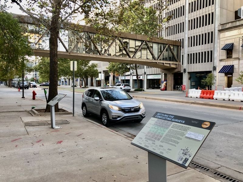 The Citizens' Committee Marker, in background, next to car. image. Click for full size.