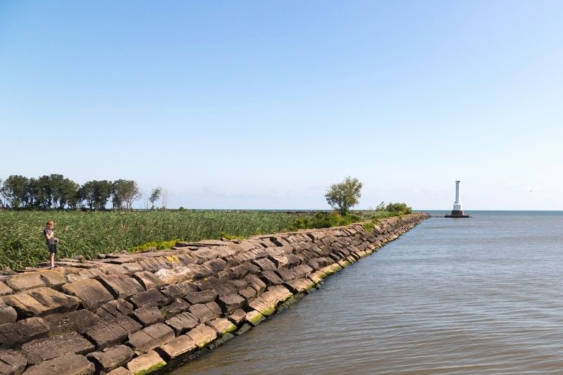 Boy Fishing Off Lighthouse Breakwater. Click for full size. Boy Fishing Off Lighthouse Breakwater image. Click for full size.