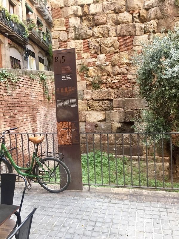 Roman Tower: Plaça dels Traginers Marker - wide view. Click for full size. Roman Tower: Plaça dels Traginers Marker - wide view image. Click for full size.