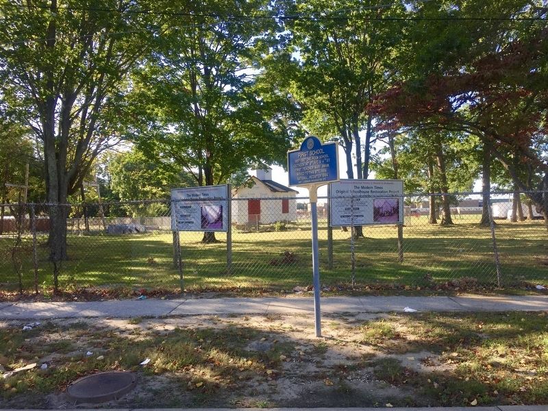 First School Marker - with schoolhouse in background. Click for full size. First School Marker - with schoolhouse in background image. Click for full size.