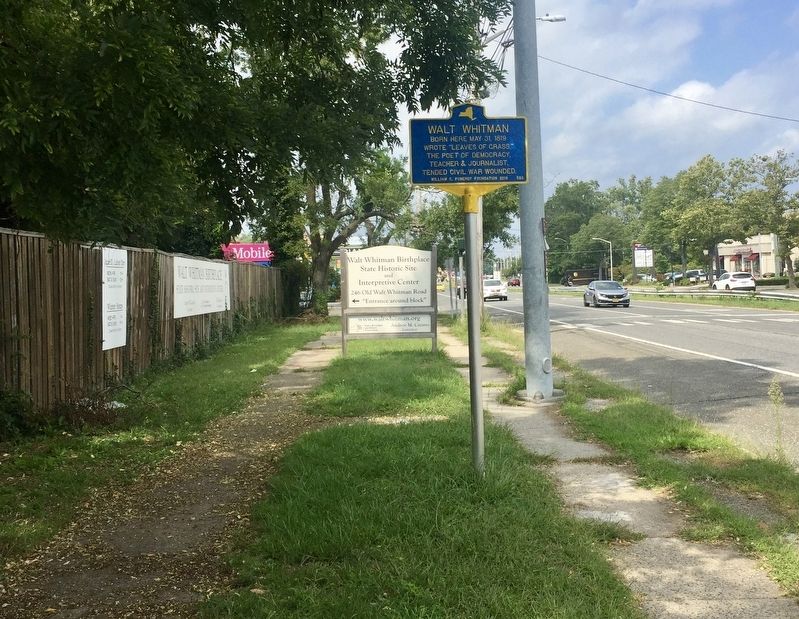 Walt Whitman Marker - wide view, looking north on Walt Whitman Road. image. Click for full size.