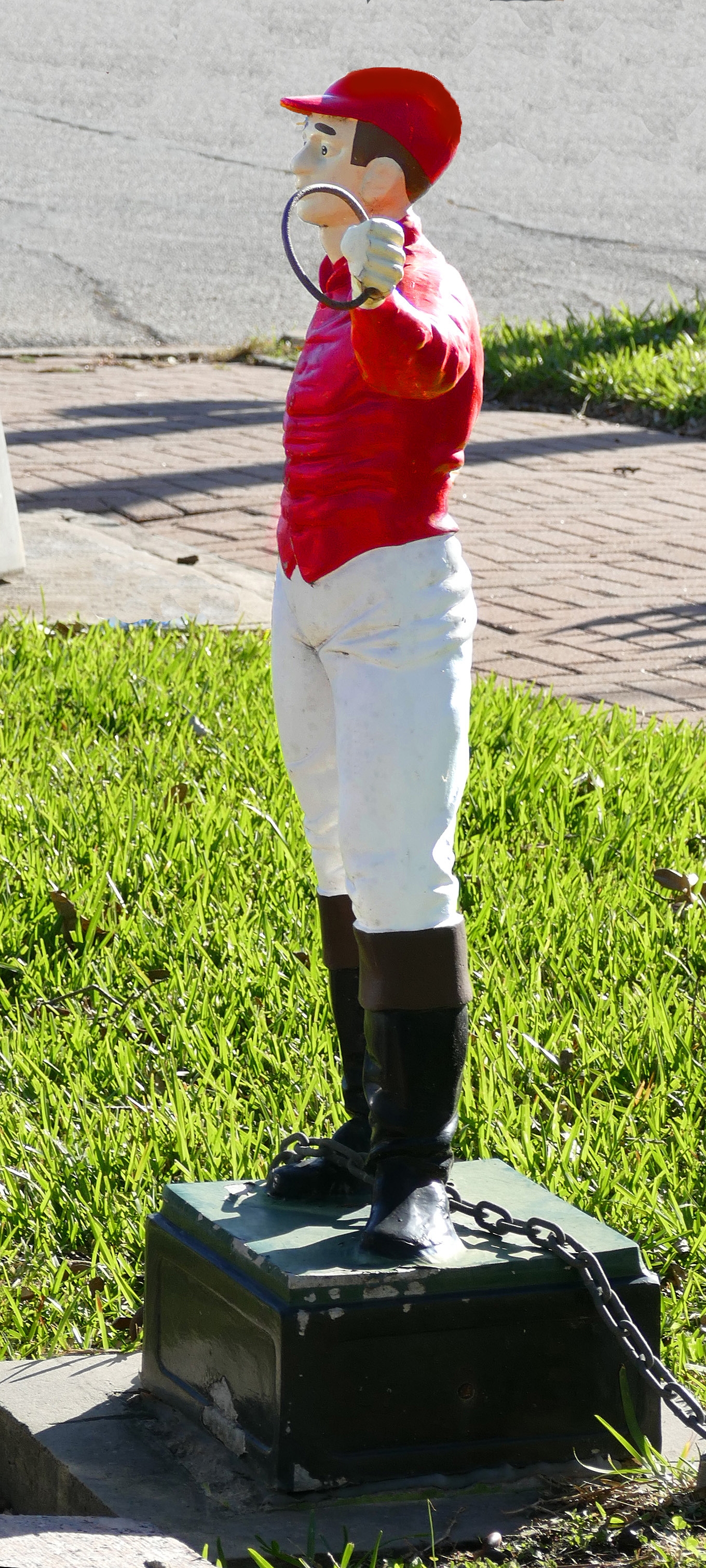 Lawn Jockey at street in front of house