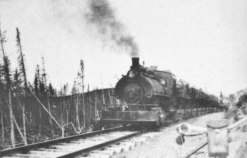 Marker detail: Arrival of train at Lac Long, circa 1910 image. Click for full size.