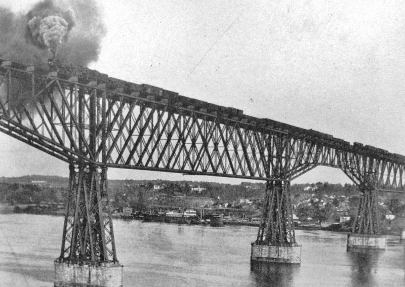 Marker detail: A long freight train heads west across the bridge (<i>undated</i>). Click for full size. Marker detail: A long freight train heads west across the bridge (<i>undated</i>) image. Click for full size.