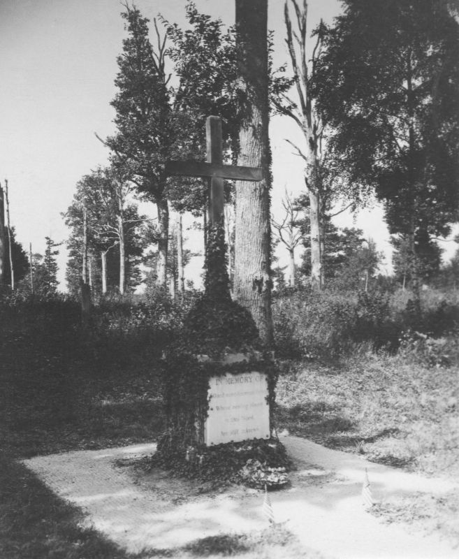 Small memorial cross to the men whose bodies were never recovered for burial. image. Click for full size.