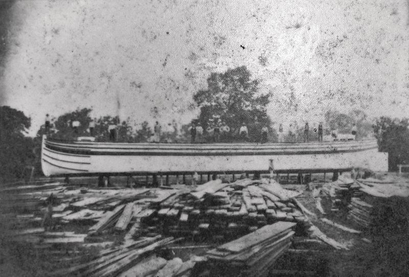 Marker detail: Men standing on the deck of a newly constructed canal boat image. Click for full size.