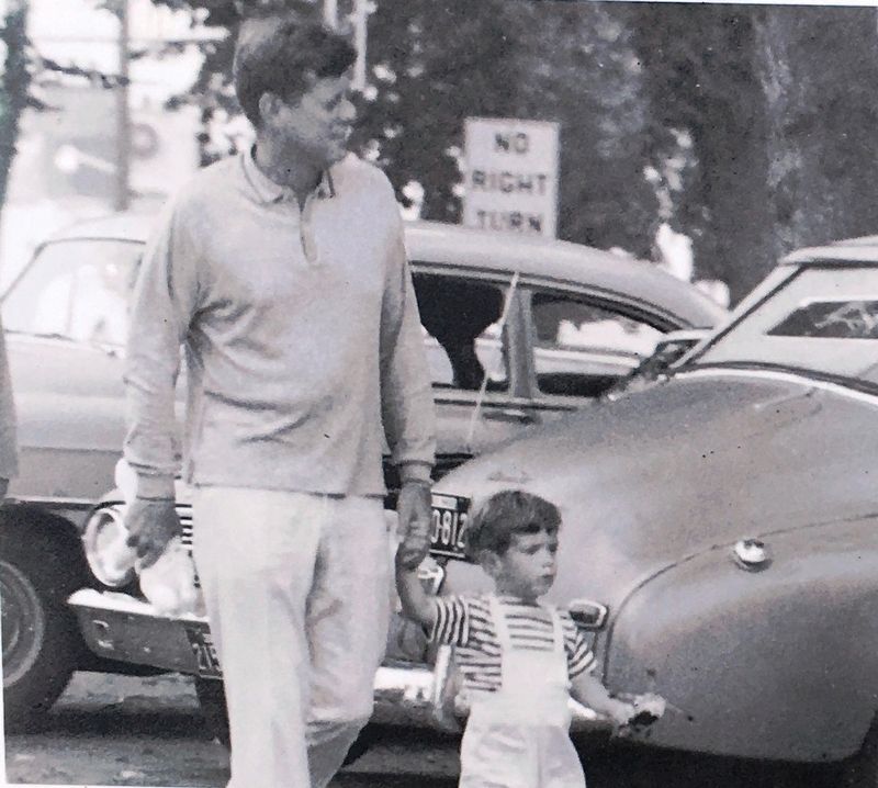 Photo Insert: JFK with his son. Click for full size. Photo Insert: JFK with his son image. Click for full size.