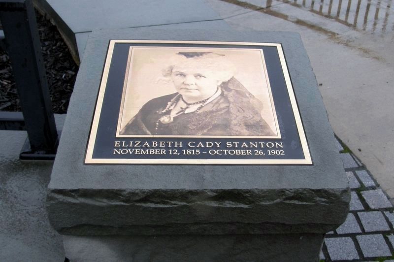 Elizabeth Cady Stanton plaque flanking the park entrance. Click for full size. Elizabeth Cady Stanton plaque flanking the park entrance image. Click for full size.
